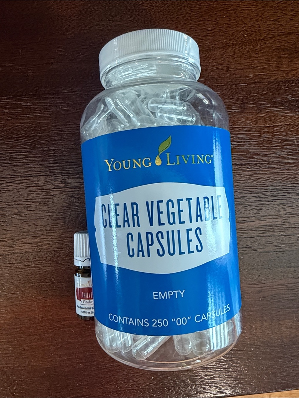 Young Living Clear Vegetable Capsules & Thieves essential oil